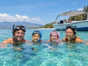 family enjoying a relaxed Gili Islands snorkeling trip